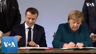 Merkel, Macron Sign Germany-France Friendship Treaty