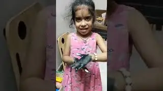 shivya applied colour on hands while drawing