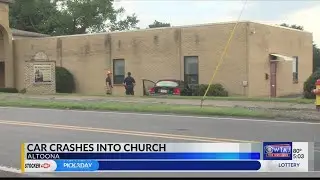Car crashes into church