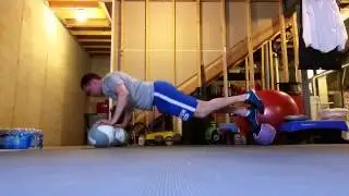 3 med ball pushups with one leg up Demo
