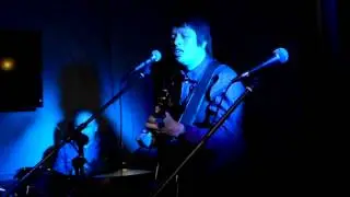 Andy Booker sings an original song and a cover back to back.