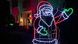 Fraser Hill Farm 2024 5-Ft. Prelit LED Santa with Waving Arm Outdoor Decoration