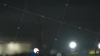 Barbed wire fence with night lights