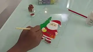 Santaclose christmas tree, rain deer drawing and painting in the acrylic sheet