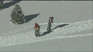 Plow and driver fall through ice at Evergreen Lake