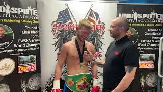 Scott Brewer speaking with Alex Pszczola after his kickboxing  victory on JackHammer UK