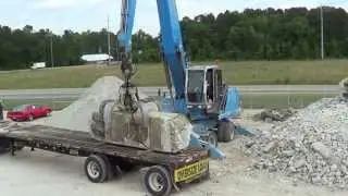 Sunshine Recycling removes Bridge Sections with Terex Fuchs MHL360
