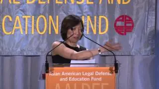 Sandra Leung presents Justice in Action Award to John W. Kuo
