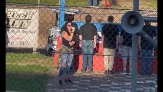 Andrea Haffner Singing the National Anthem at School Bus Races