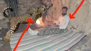 Nsman Building a safe shelter under a cliff with rocks