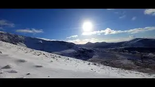 One slip and we're gone off Wales highest mountain.