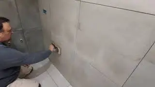Grouting gray ceramic tiles with gray grout