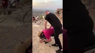 Phoenix Chiropractor Gives Chiropractic Adjustment on Top of South Mountain in Phoenix.