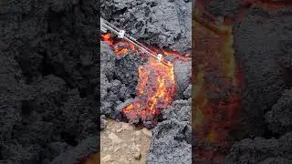 A human skull is found in lava. AI video.