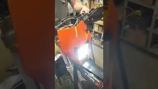 Skene IQ 275 headlight with Acerbis VSL headlight