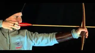 Slow motion video of primitive archery, nocking point height is just right