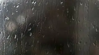4K Raindrops Move Down On The Window. Time-Lapse Video - Stock Footage