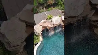 Who doesn&rsquo;t love a natural rock grotto? #backyardpool #luxurypools #dreampool #insanepools