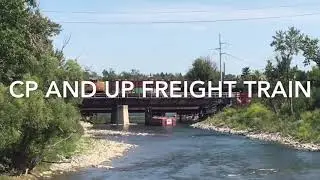 CP and Union Pacific freight train switching sidings in Alyth yard downtown Calgary