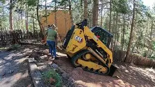 Steep Grade With Skid and Mini Ex