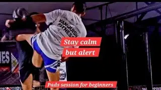 Keep your composure the whole time. Muay Thai pads session for beginners.  