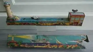 GEM Lighthouse tin toy France en tole bateau wind-up