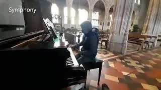 Playing 'Symphony' on the Piano at Lavenham Church, Suffolk. Played by James Barker, 12.