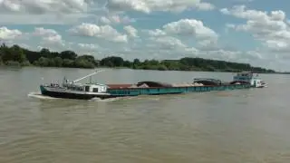 commercial cargo ships on the Rhine River in Germany