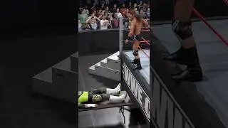 WWE 2K25 Drew McIntyre Dives Off The Apron Through The Table