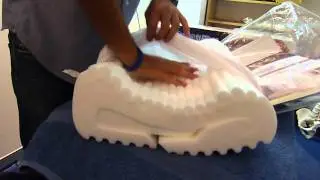 Chiropractor demonstrates memory foam pillows