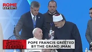 #PopeFrancis enters in a wheelchair and is greeted by the Grand Imam of Al-Azhar
