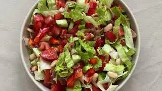 Vegetable salad with bacon and poppy seeds