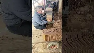 Tile Stacker's Rhythm: The Synchronized Transfer from Machine to Cart