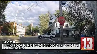 Troy Police vehicle caught on camera running through stop sign