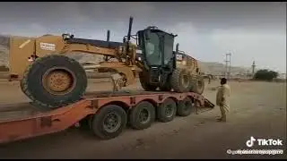 Grader operator loading grader to site change