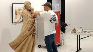 Benjamin Victor sculpting at Stuhr Museum