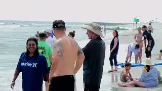 Waterfront Warriors Life's a Beach Surfing & Pig Roast