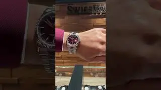 Rolex Day-Date 36mm President White Gold Cherry Red Dial Watch 118239 Wrist Roll | SwissWatchExpo