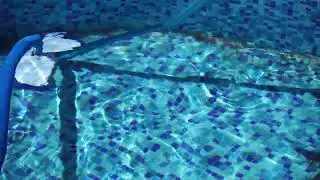 vacuuming the dirty bottom of a swimming pool 2023 11 27 05 24 53 utc