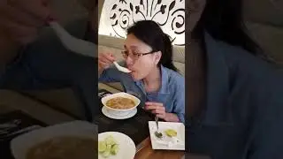 Eating Mohinga in Rangoon - a candid moment