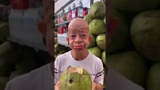 bald wrinkly guy drinks coconut and then burps