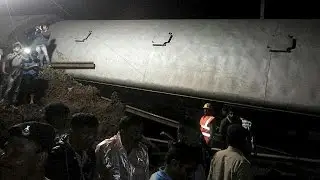 At least 20 killed as two trains derail in central India