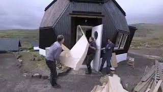 Installing the staircase in dome house, Leynar, Faroe Islands.