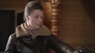 Hitwoman in tight leather pants, leather jacket & leather gloves