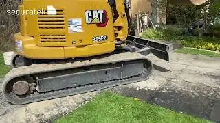 Mini Bagger auf Scobaplate Bodenschutzplatte