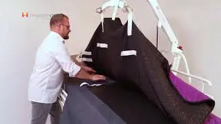 Håndtering af glideflapper på et master care madrascovers med lift