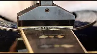 Fret press on Ovation Custom Legend