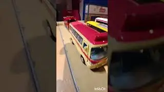 Comecinistas de buses de metal escala