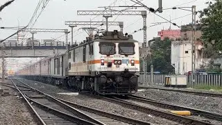 Dangerous WAP7 Howrah Rajdhani is blasting through Dankuni Junction at flat 130 Kmph