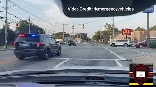Multiple Warwick Police cruisers responding with lights and sirens